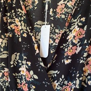 Black and Floral Short Sleeve High-Low Wrap Dress by Superfoxx